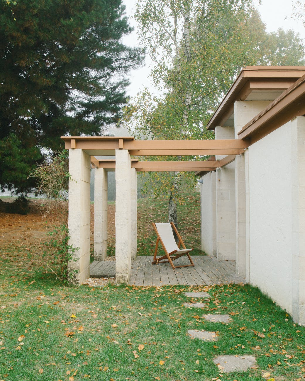 backyard of modern cottage with chair