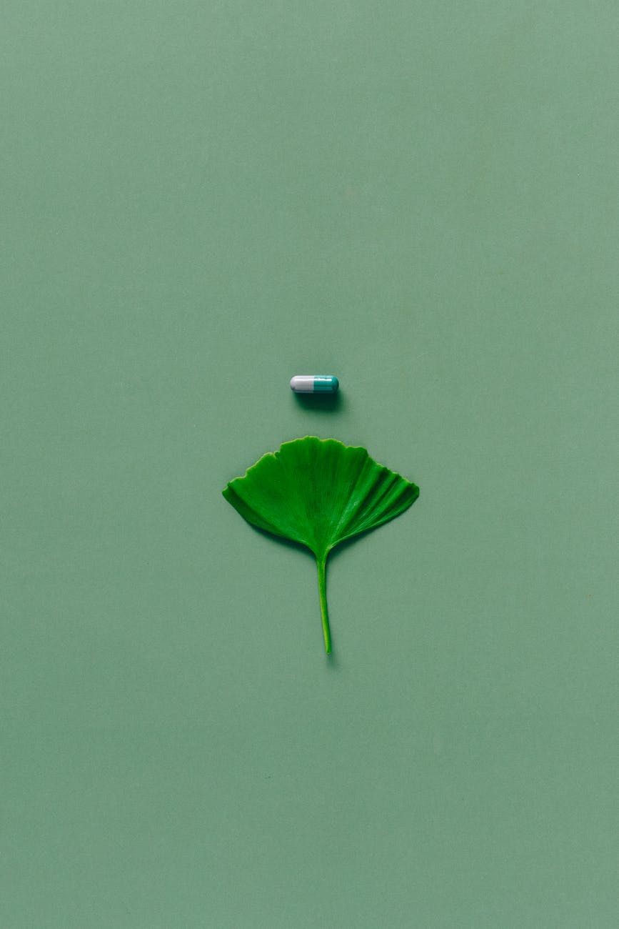 capsule in green background